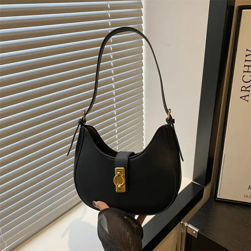 Women shoulder bag with gold claps